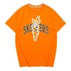 Camiseta gráfica Skechers x Carrots «Naranja Blanco Negro»