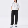 Pantalones casuales de cintura alta con letras del logotipo «Negro»