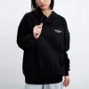 Sudadera con capucha y logo impreso «Negro Blanco»